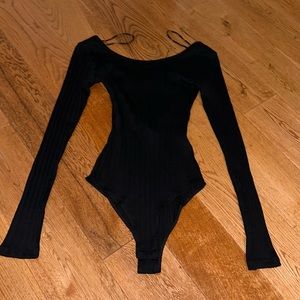 H&M XS black body suit , very good condition , crisscross back
